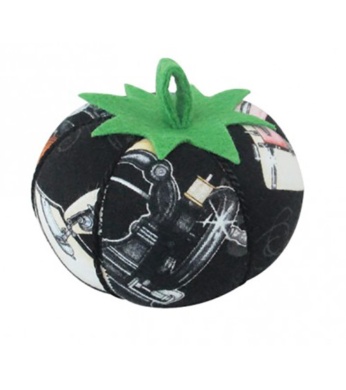 Tomatoes pin holder sewing machine black background