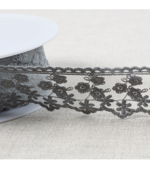 Embroidered tulle with small matte flowers 44mm medium gray per meter