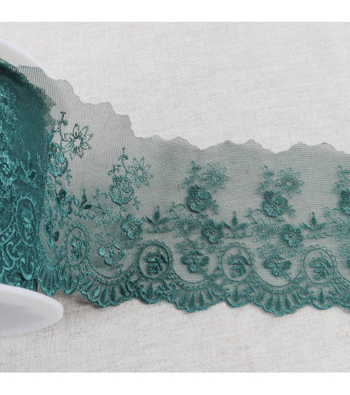 Tulle embroidered with shiny scalloped flowers 110mm duck blue per meter