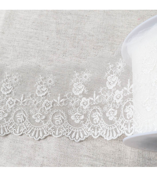 Tulle embroidered with shiny scalloped flowers 110mm ecru per meter