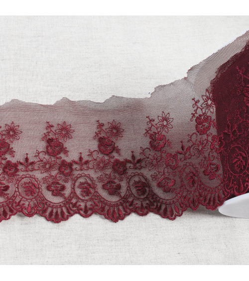 Tulle embroidered with shiny scalloped flowers 110mm plum per meter