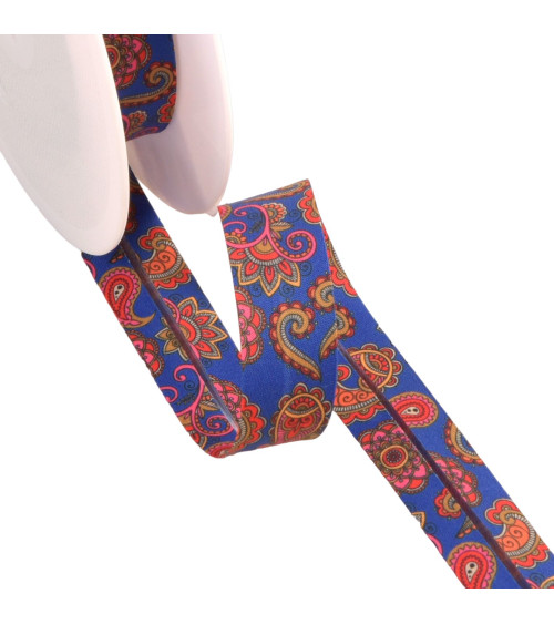 Spool of 25m bias binding with royal blue paisley pattern 20mm