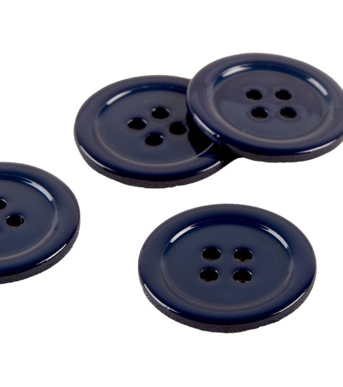 Bottone rotondo in madreperla blu navy al 100%.