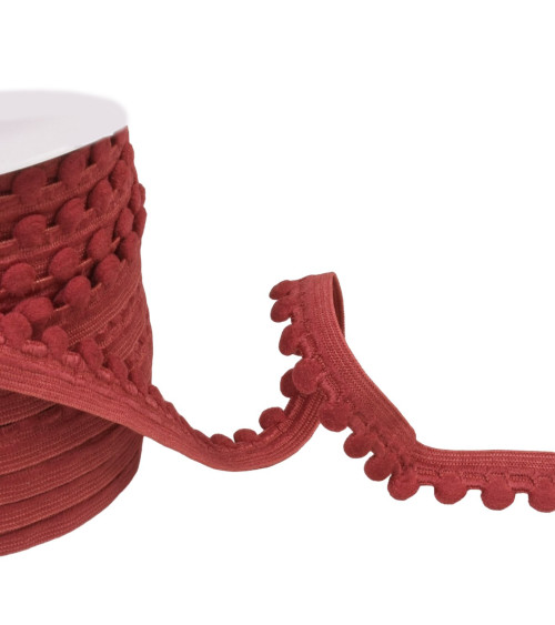 Spool of 25m elastic with burgundy red pompoms 13mm