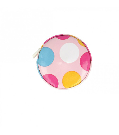 Polka dot tape measure on pink background